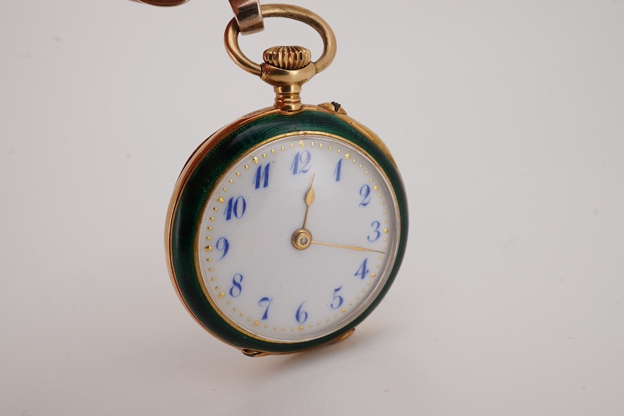 An early 20th century 18ct gold and two colour enamel open faced fob watch(enamel a.f.), with Arabic dial, case diameter 27mm, suspended from a Murrle Bennett & Co 9ct brooch. Condition - poor to fair